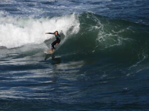 the surf guide on a left surf guide algarve