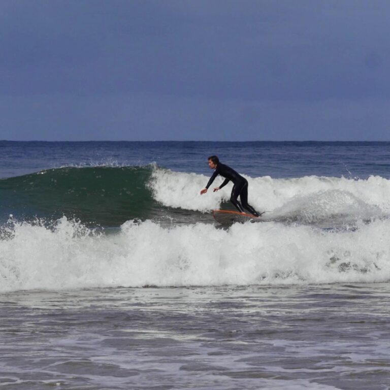 surf guide algarve fanboy on a nice wave in beliche