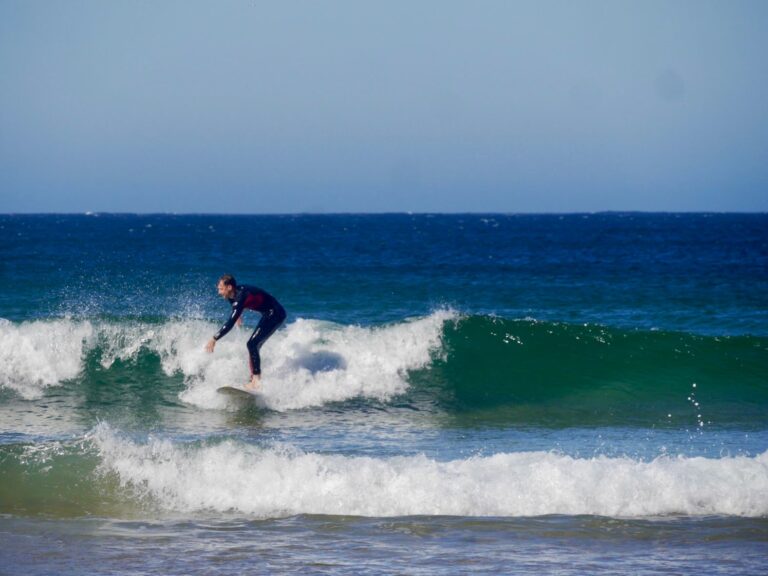 surf guide algarve guest going right on a left at beliche