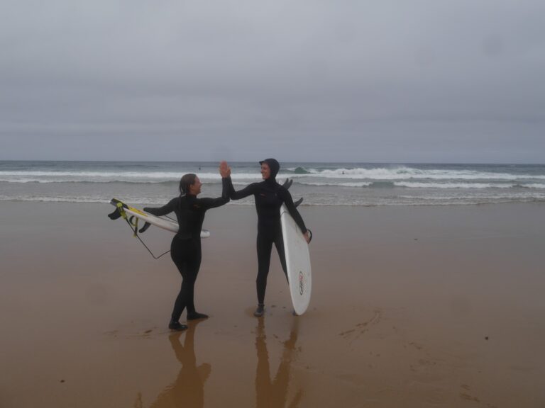 high five on a super fun session with surf guide algarve