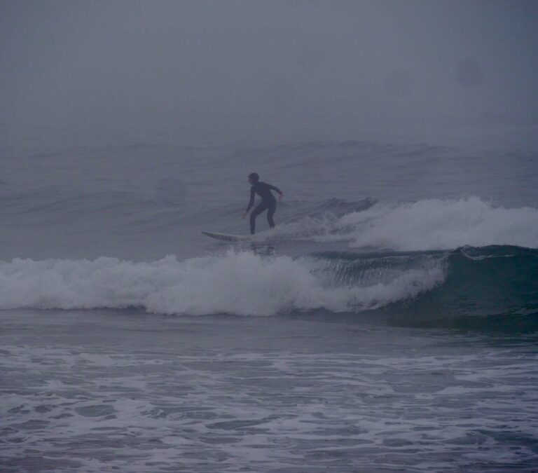misty morning surfing with surf guide algarve