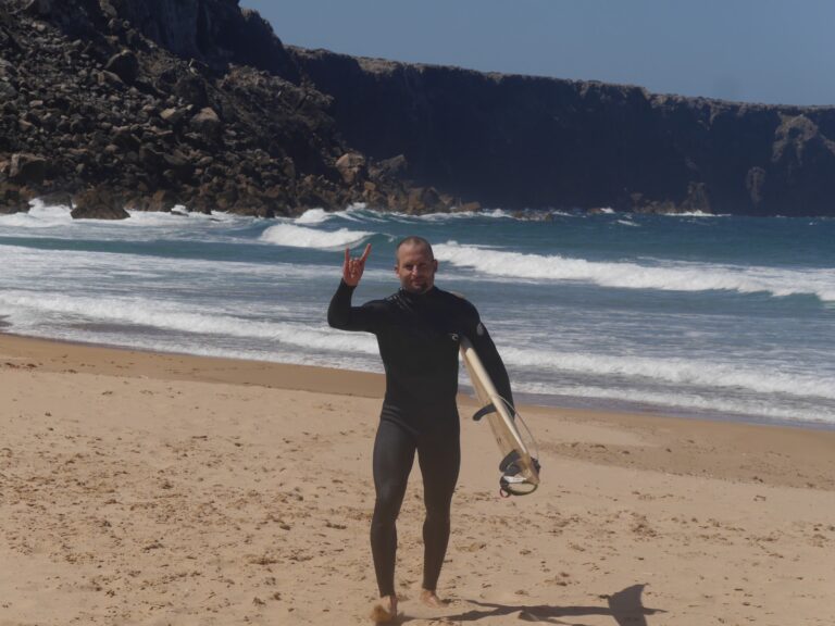 stoked surf guide algarve guest on the beach