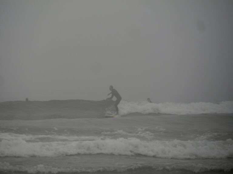 clean longboard waves in the fog surfing with surf guide algarve