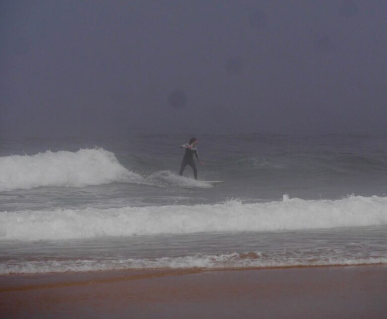 foggy surf surfgirl going left surf guide algarve