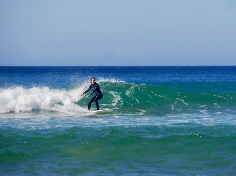 fun waves surfgirl on a nice left surf guide algarve