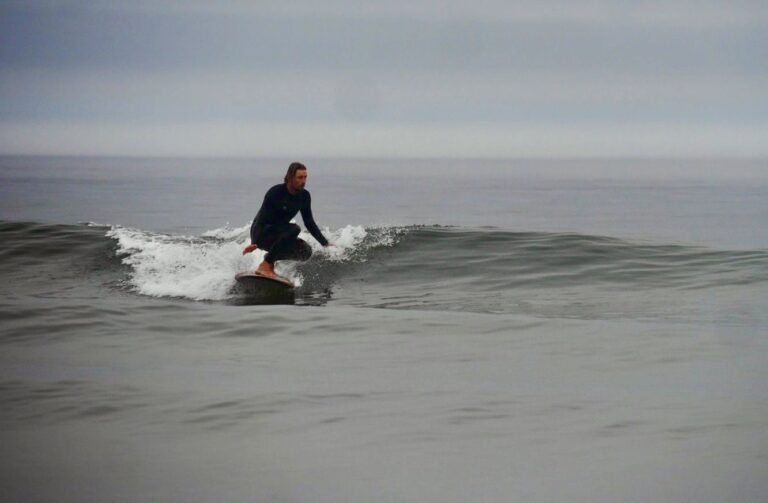 longboard surfing at cordoama with surf guide algarve and friends