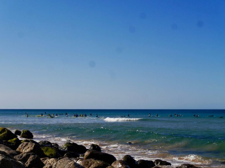 the other side of summer, surf guide algarve zavial summer crowds