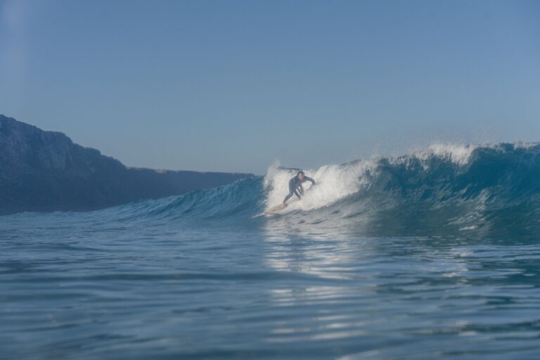 surf guide algarve guest going left with giancarlos