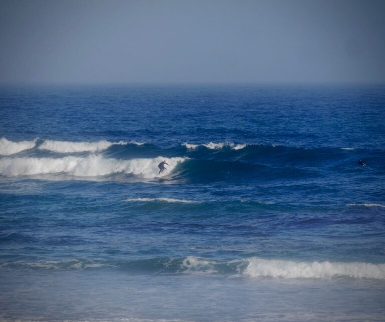 twin pin action going left surf guide algarve