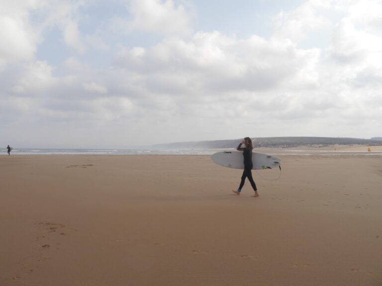 surf guide algarve empty beach bordeira