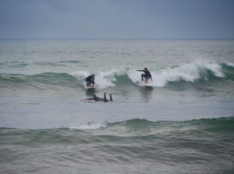 girl power sharing the wave at barranco surf guide algarve