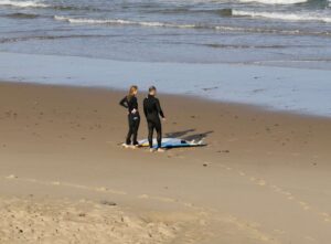 brother and sister surf guiding