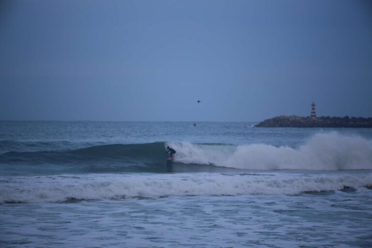 first wave of the day at supertubos with surf guide algarve