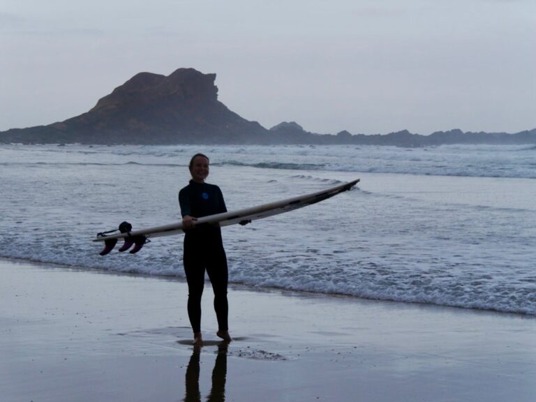 happy surf guide guest after surf