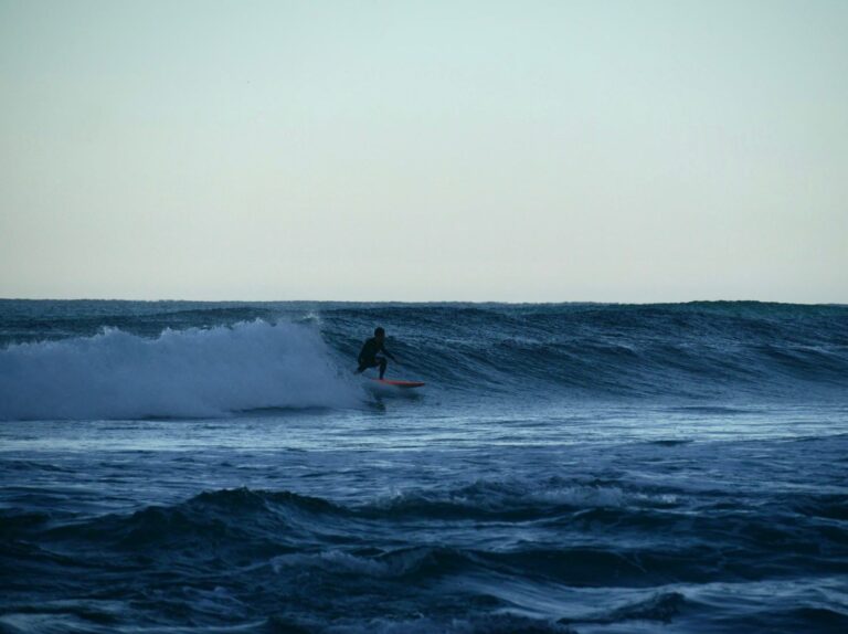 surf guide algarve guest going left at cordoama