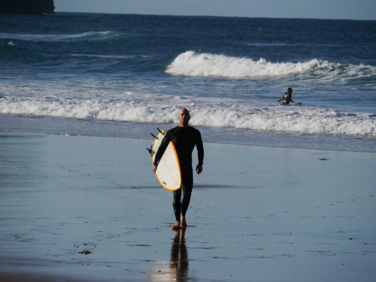 the boss surf guide algarve guest on the beach