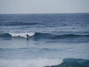 big period point break action with surf guide algarve