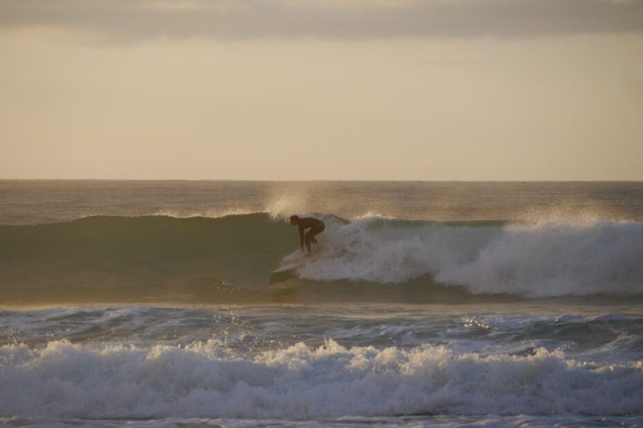 golden waves in Porto de Mos Lagos with surf guide algarve,