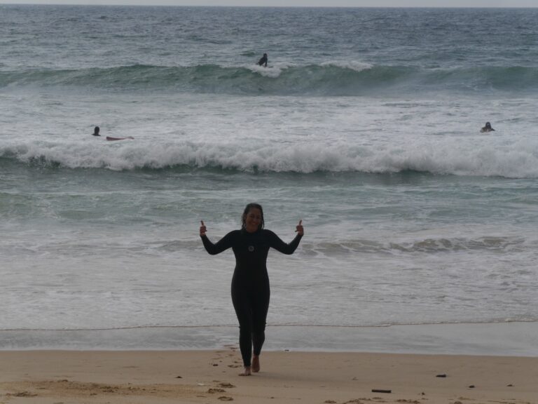 stoked surf guide algarve guest on the beach.