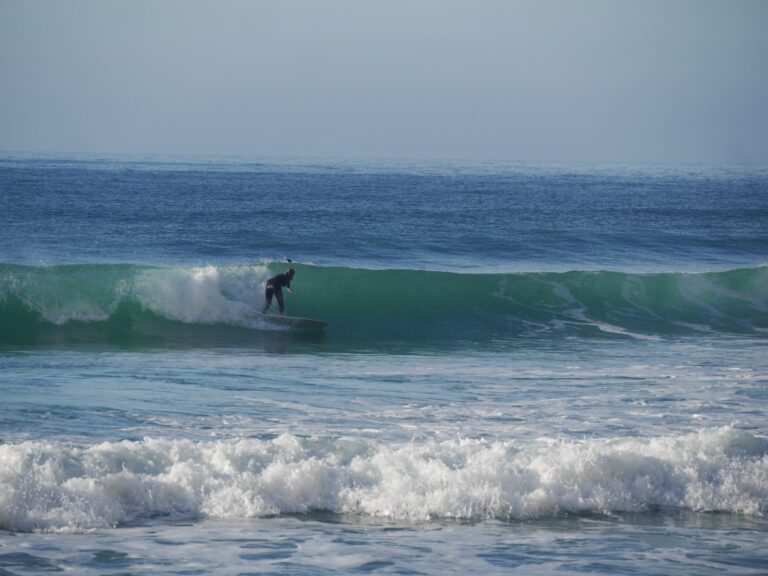 sunrays going left surf guide algarve porto de mos