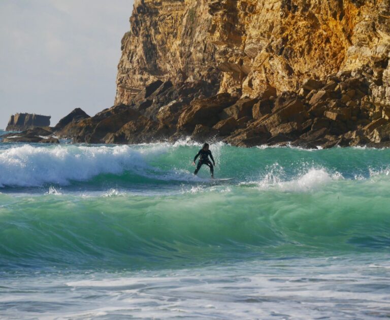 surf guide algarve guest going left at barranco