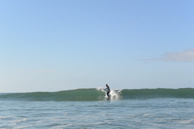 longboard surfing zavial, with surf guide algarve