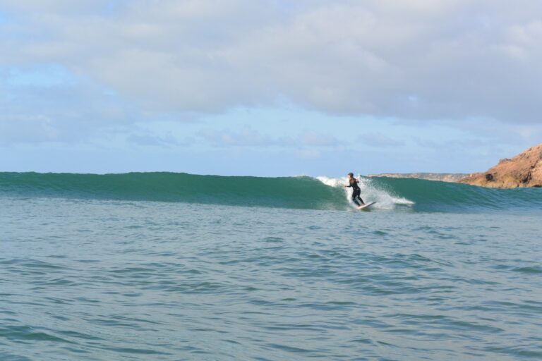 water shot surf guide algarve at zavial longboard girl