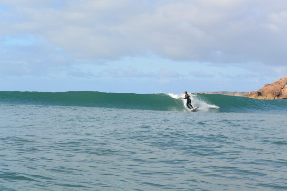 water shot surf guide algarve at zavial longboard girl